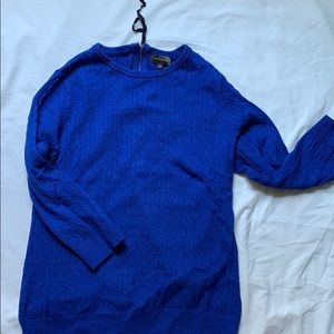 Cobalt blue sweater with 3/4 length sleeves.